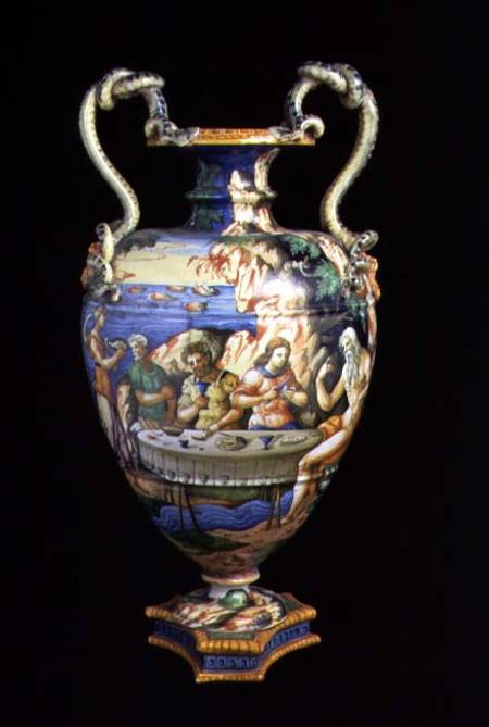 Maiolica urn with two handles in the shape of serpents, the body decorated with an al fresco banquet a Orazio Fontana of Urbino