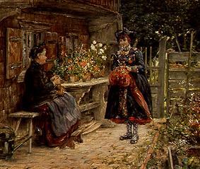 Young woman in Dachauer dress on visit with the aged farmer a Otto Piltz