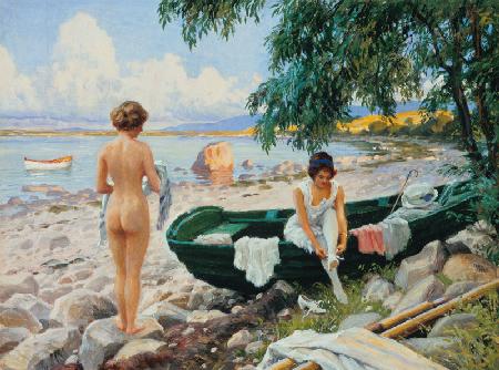 Girls on the beach taking a bath.