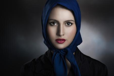 The girl with the blue scarf