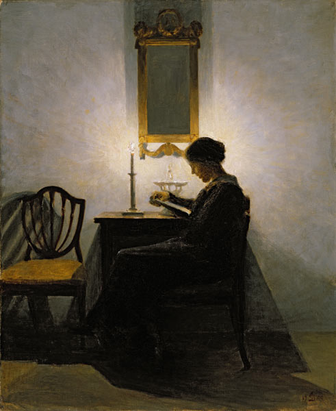 Woman reading by candlelight a Peter Vilhelm Ilsted