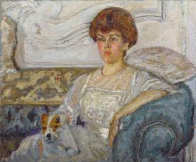 Woman on a blue sofa