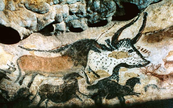 Rock painting of a bull and horses a Prehistoric