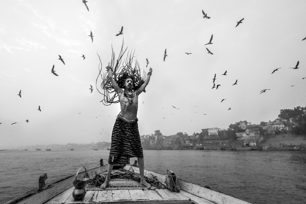 Naga Sadhu posing on boat at varanasi a Prithul Das