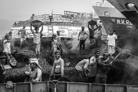 Coal boat with labourers