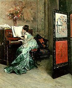Lady at the piano playing a Raimundo de Madrazo