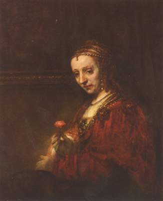 Woman with pink a Rembrandt van Rijn