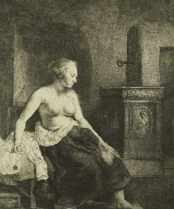 Sitzende Frau an einem Ofen a Rembrandt van Rijn