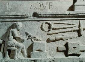 Relief depicting a blacksmith's shop and tools