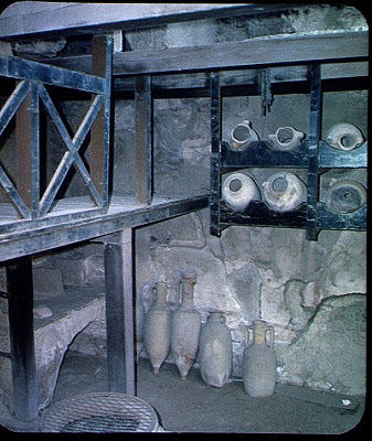 Interior of a shop with amphorae, from the House of Neptune and Amphitrite (photo) a Roman 1st century AD