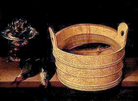 Artichoke on three-legged embers stove and water washtub with carps
