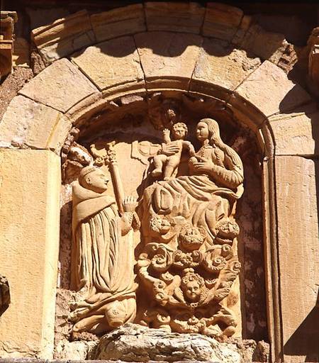 Madonna and Child with a Cistercian Monk, detail from the facade of the monastery founded in 1194 an a Spanish School