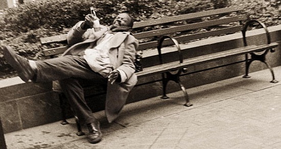 Drunk man on a park bench a Stephen  Spiller