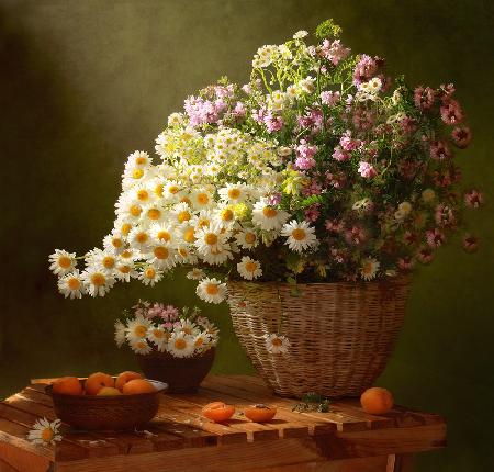 Still life with a basket of wildflowers