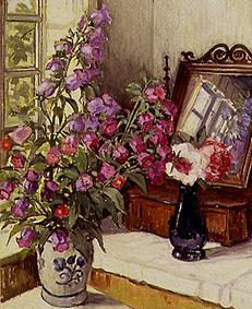 Quiet life with thimble and roses on a dressing table