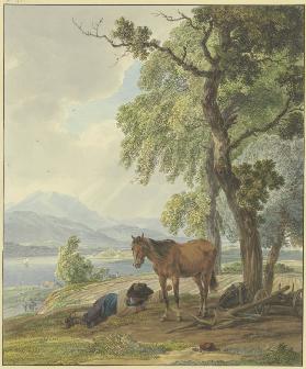 Ruhender Bauer mit seinem Pferd neben dem gepflügten Acker
