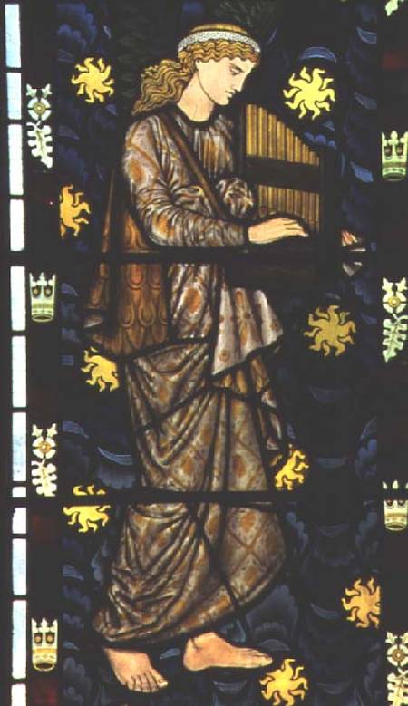 Angel with a portative organ, stained glass window designed a William  Morris