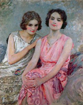 Two Young Women Seated 