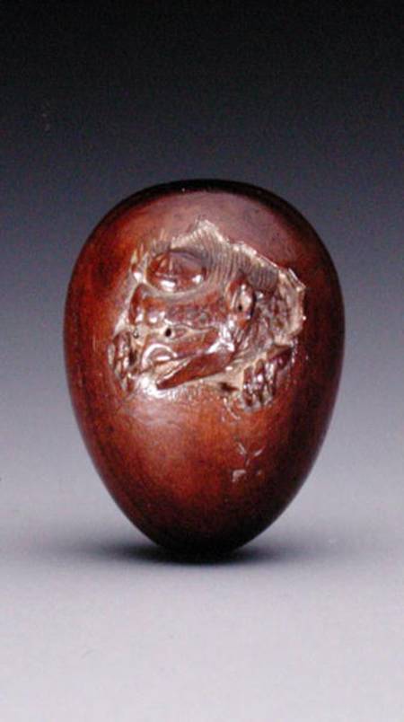 Netsuke depicting a crow emerging from its egg a Yuzan