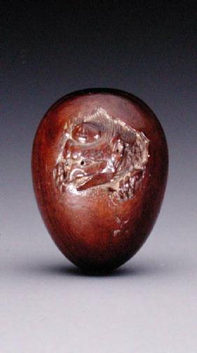 Netsuke depicting a crow emerging from its egg